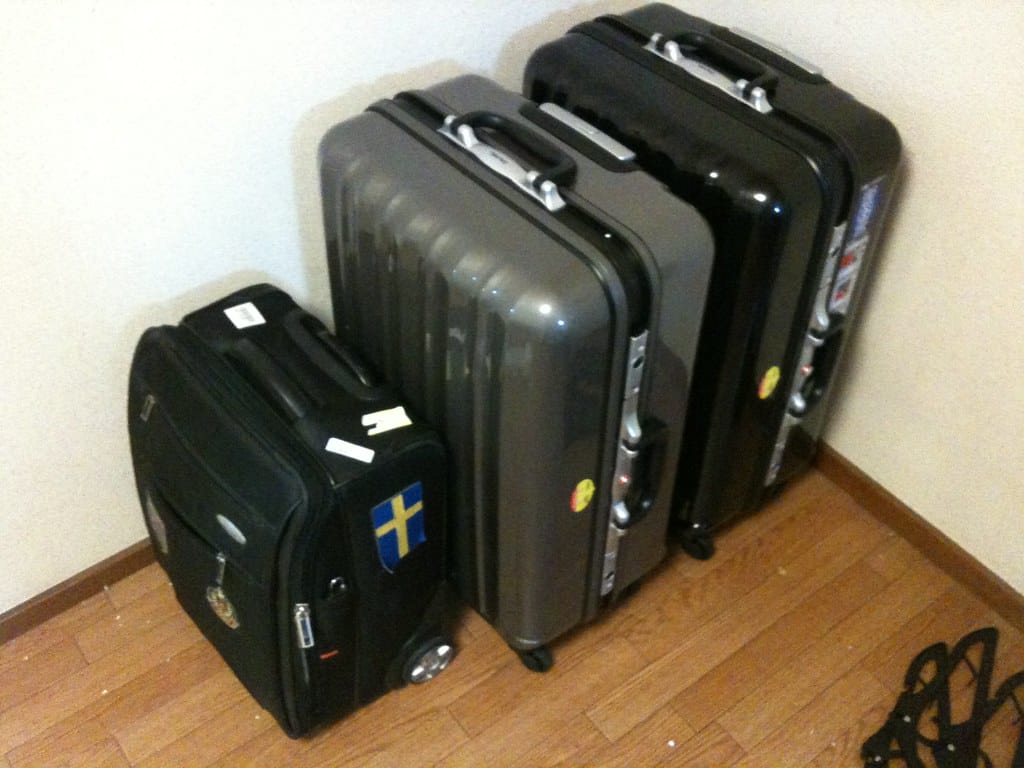 Open suitcase packed and ready for a Malta trip