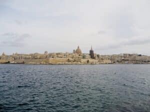 View of Valletta's rooftops and fortifications seen across the harbour from Sliema