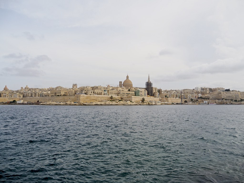 View of Valletta's rooftops and fortifications seen across the harbour from Sliema